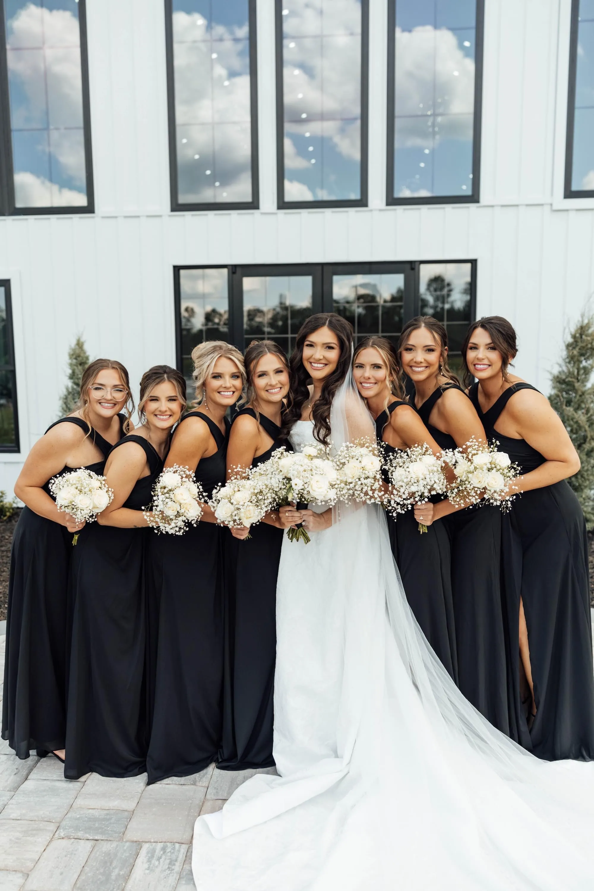 Bride and bridesmaids wedding party photos at North Rail elegant event space