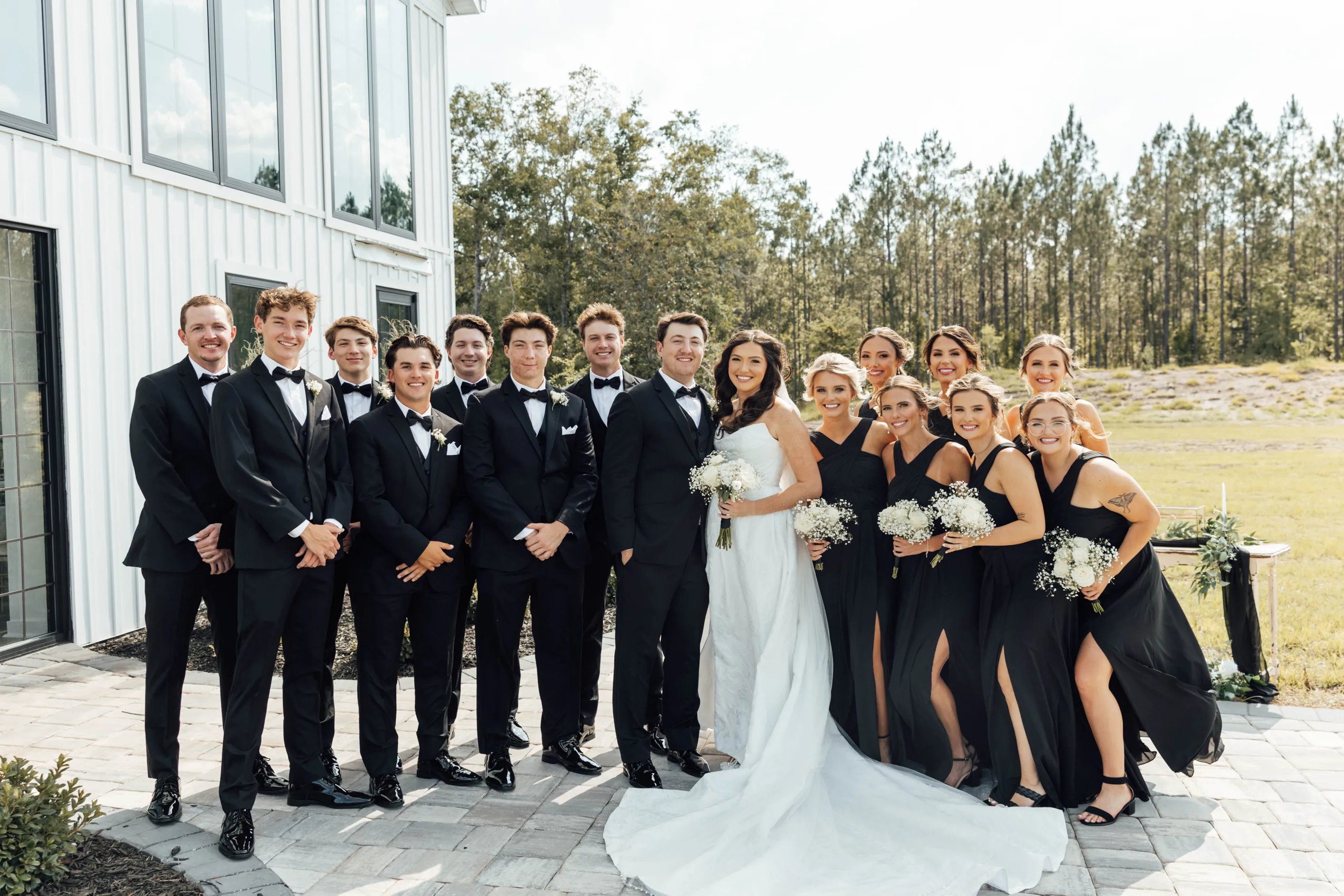 Complete wedding party group photo at North Rail upscale wedding venue
